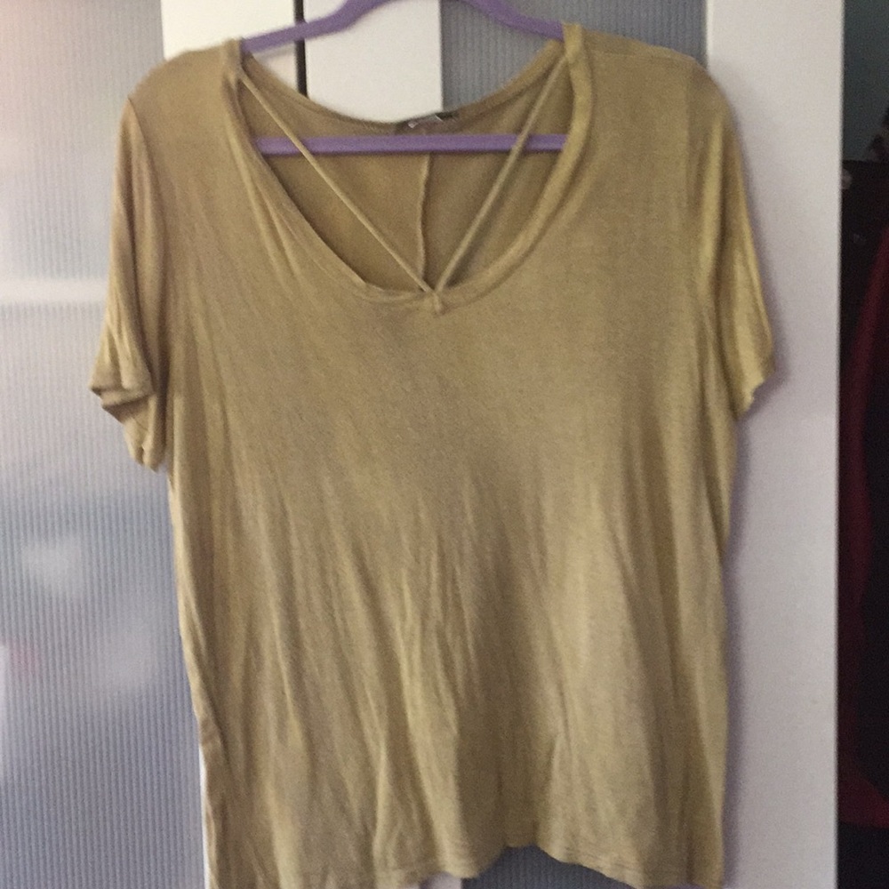 Cute top with criss cross front design